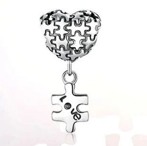 S925 AUTISM AWARENESS PUZZLE HEART CHARM